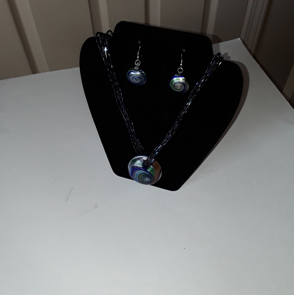 Fashionable necklace and matching earring set.